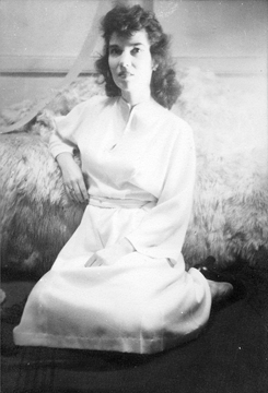 Ruth in a white dress, c. 1940