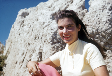 Ruth by a sand bluff, c. 1950s