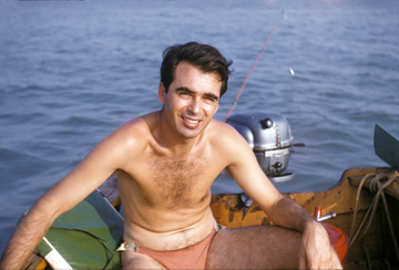Svetozar in a small boat, 1950s